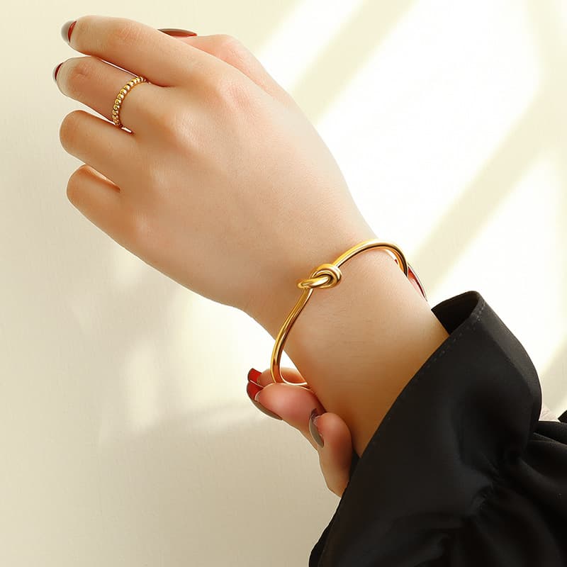 European and American Style, Unique and Fashionable Thick and Thin Open Knot Bracelet, Titanium Steel Gold-Plated, Rui Li Business High-End Design